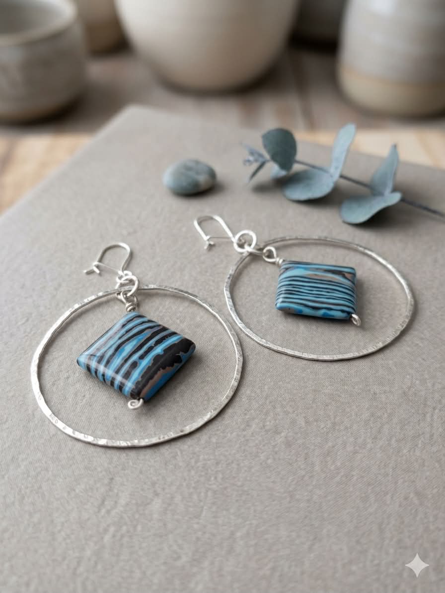 Sterling Silver Hammered Hoop Earrings With Blue Striped Bead