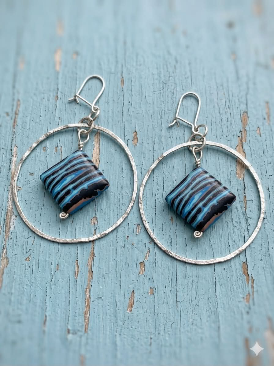 Sterling Silver Hammered Hoop Earrings With Blue Striped Bead
